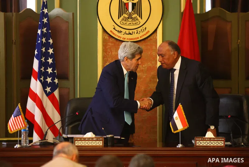 U.S. Secretary of State John Kerry, left, and Egypt's Foreign Minister Sameh Shoukry attend a press conference after their meeting at the foreign ministry in Cairo, Egypt, Sunday, Aug. 2, 2015. The United States and Egyp...
