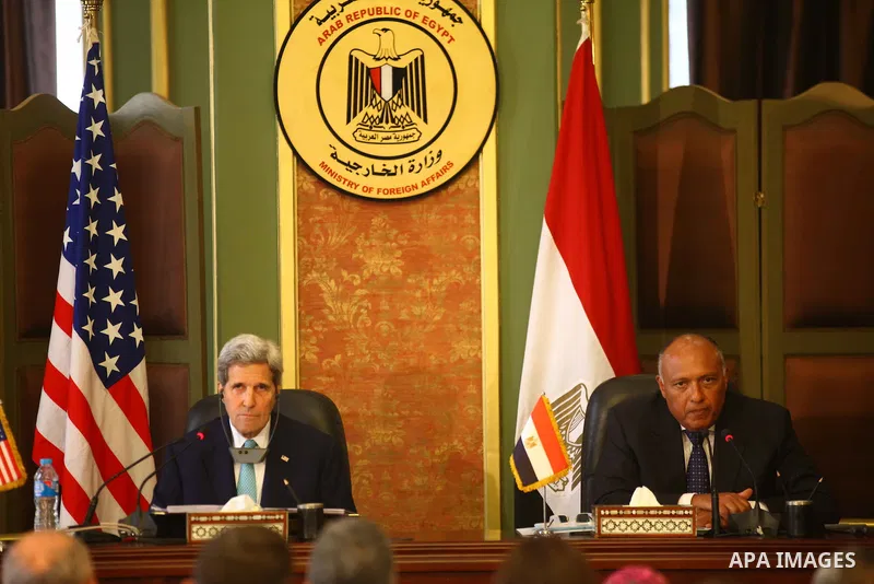 U.S. Secretary of State John Kerry, left, and Egypt's Foreign Minister Sameh Shoukry attend a press conference after their meeting at the foreign ministry in Cairo, Egypt, Sunday, Aug. 2, 2015. The United States and Egyp...