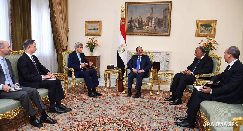 A handout photo provided by the Egyptian Presidency shows US Secretary of State John Kerry (L) speaking to Egyptian President Abdel Fattah al-Sisi during a meeting in Cairo, Egypt, 02 August 2015. Kerry arrived in Cairo...