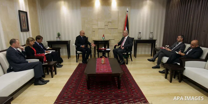 Palestinian Prime Minister Rami Hamdallah meet with Coordinator of Humanitarian Affairs in the United Nations, Robert Bieber, in the West Bank city of Ramallah, on August 03, 2015. Photo by Prime Minister Office