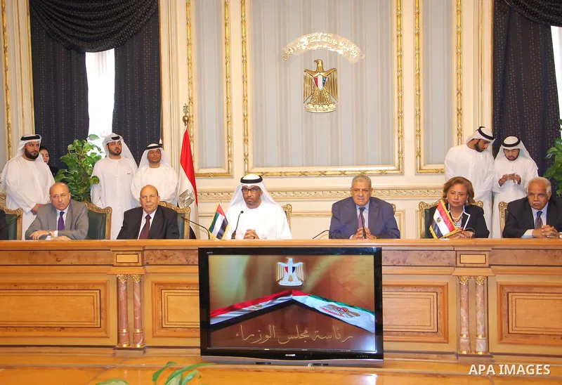 Egypt's Prime Minister Ibrahim Mahlab attends a signing ceremony with UAE minister of State Sultan Ahmed Al-Jaber, in Cairo on August 4, 2015. Mahlab, witnessed, today, the signings of delivery protocols for four of the...