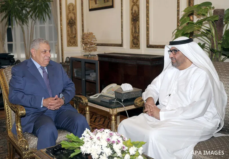 Egypt's Prime Minister Ibrahim Mahlab attends a signing ceremony with UAE minister of State Sultan Ahmed Al-Jaber, in Cairo on August 4, 2015. Mahlab, witnessed, today, the signings of delivery protocols for four of the...