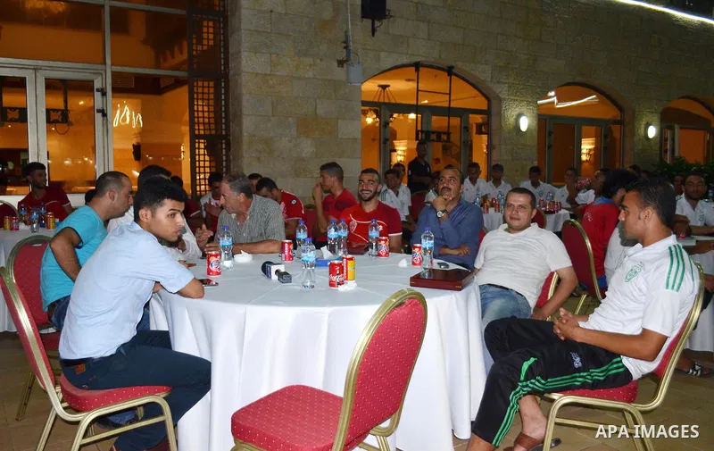 Members of the Shejaia soccer team, attend a reception ceremony of the Hebron's Al-Ahly team in Gaza city on August 4, 2015. The soccer teams of the Gaza Strip's Shejaia and al-Ahly from Hebron in the Israeli-occupied We...