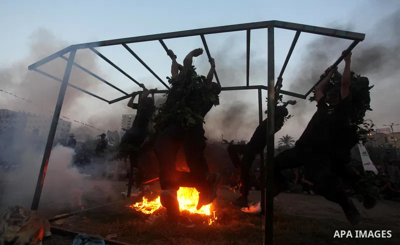 Palestinian youths demonstrate their skills during graduation ceremony of a military-style camp organized by the Hamas movement in Gaza City on August 5, 2015. Hamas's armed wing organized ''Liberation Youths Camps'' for...