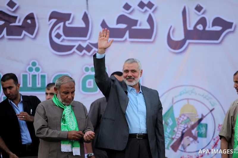 Senior Hamas leader Ismail Haniyeh attends a graduation ceremony of a military-style camp organized by the Hamas movement in Gaza City on August 5, 2015. Hamas's armed wing organized ''Liberation Youths Camps'' for young...