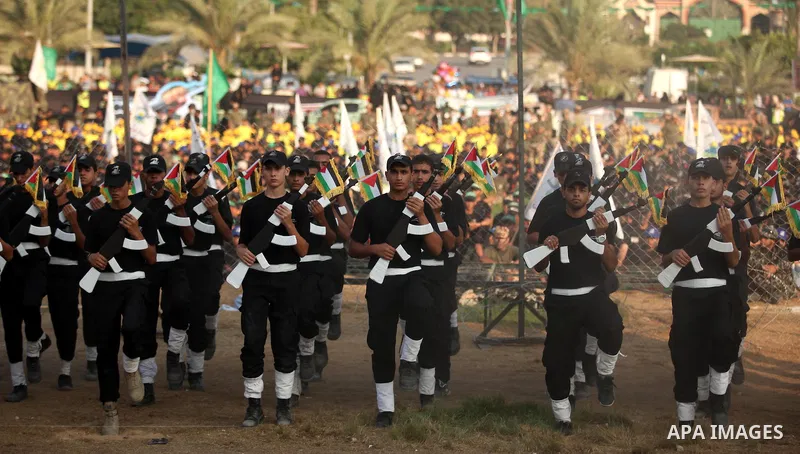 Palestinian youths demonstrate their skills during graduation ceremony of a military-style camp organized by the Hamas movement in Gaza City on August 5, 2015. Hamas's armed wing organized ''Liberation Youths Camps'' for...