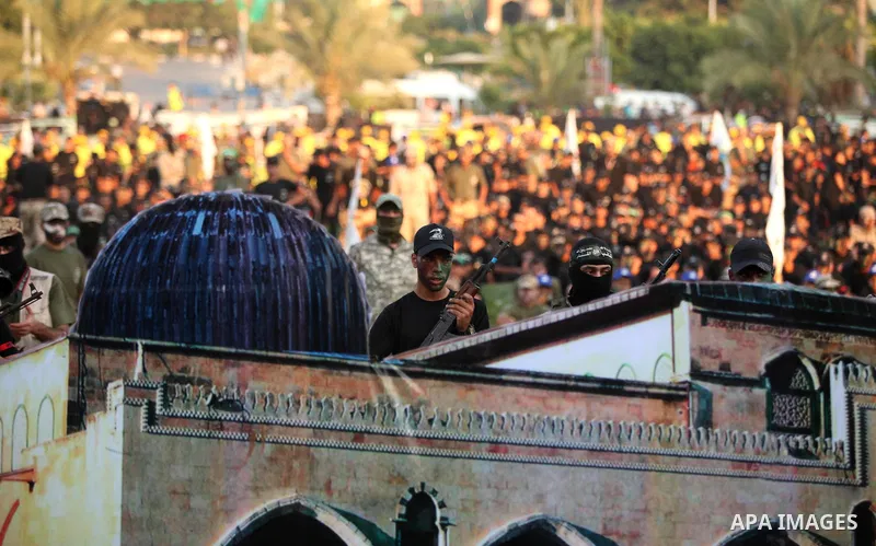 Palestinian youths take part in a graduation ceremony of a military-style camp organized by the Hamas movement in Gaza City on August 5, 2015. Hamas's armed wing organized ''Liberation Youths Camps'' for young Palestinia...