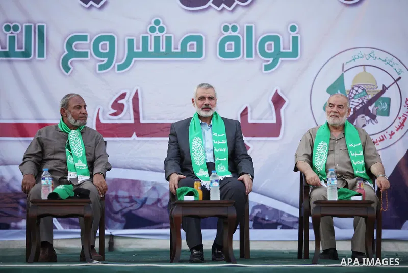 Senior Hamas leader Ismail Haniyeh attends a graduation ceremony of a military-style camp organized by the Hamas movement in Gaza City on August 5, 2015. Hamas's armed wing organized ''Liberation Youths Camps'' for young...