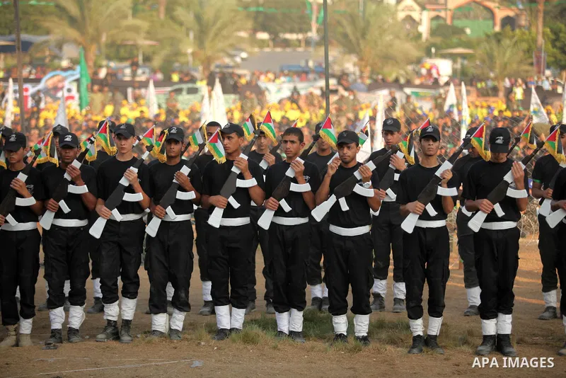 Palestinian youths demonstrate their skills during graduation ceremony of a military-style camp organized by the Hamas movement in Gaza City on August 5, 2015. Hamas's armed wing organized ''Liberation Youths Camps'' for...