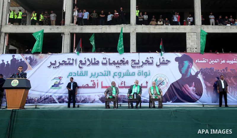 Senior Hamas leader Ismail Haniyeh attends a graduation ceremony of a military-style camp organized by the Hamas movement in Gaza City on August 5, 2015. Hamas's armed wing organized ''Liberation Youths Camps'' for young...