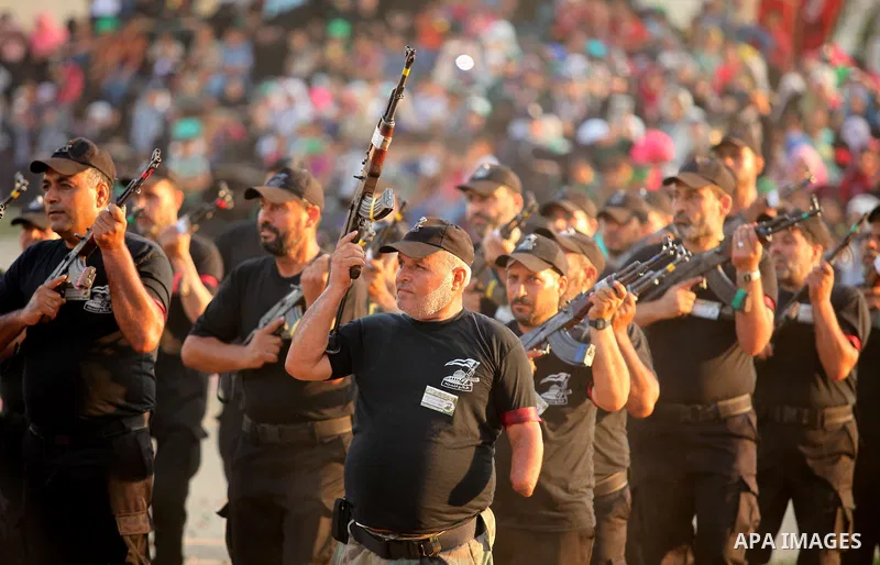 Palestinian men demonstrate their skills during graduation ceremony of a military-style camp organized by the Hamas movement in Gaza City on August 5, 2015. Hamas's armed wing organized ''Liberation Youths Camps'' for yo...