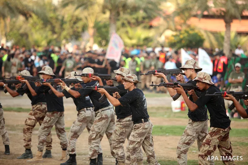 Palestinian youths demonstrate their skills during graduation ceremony of a military-style camp organized by the Hamas movement in Gaza City on August 5, 2015. Hamas's armed wing organized ''Liberation Youths Camps'' for...