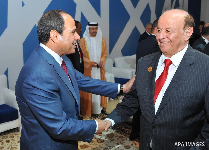 Egyptian President, Abdel Fattah al-Sisi, shakes hands with Abd Rabbo Mansour Hadi following the inauguration ceremony for the new additions to the Suez Canal, Egypt, 06 August 2015. The latest addition to the canal come...