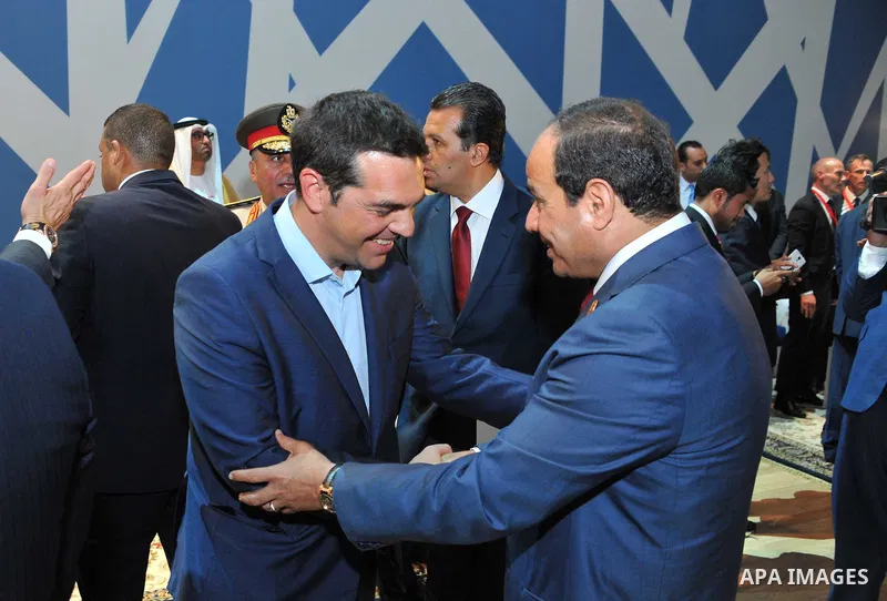 Egyptian President, Abdel Fattah al-Sisi, shakes hands with the Greek Prime Minister, Alexis Tsipras following the inauguration ceremony for the new additions to the Suez Canal, Egypt, 06 August 2015. The latest addition...