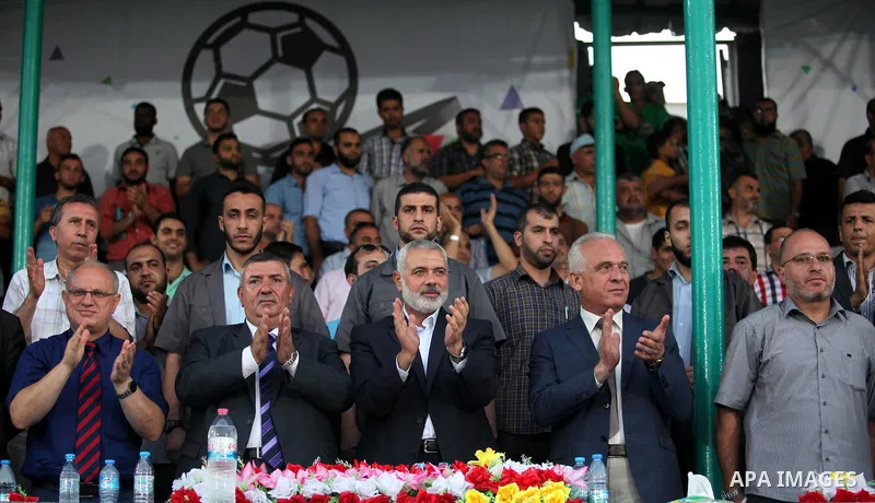 Senior Hamas leader Ismail Haniyeh, attends the first leg match of the Palestine Cup final between Palestinian Gaza's Shejaya team and Hebron's Al-Ahly team at Yarmuk stadium in Gaza City, on August 6, 2015, as the two t...
