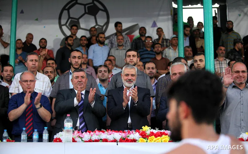 Senior Hamas leader Ismail Haniyeh, attends the first leg match of the Palestine Cup final between Palestinian Gaza's Shejaya team and Hebron's Al-Ahly team at Yarmuk stadium in Gaza City, on August 6, 2015, as the two t...