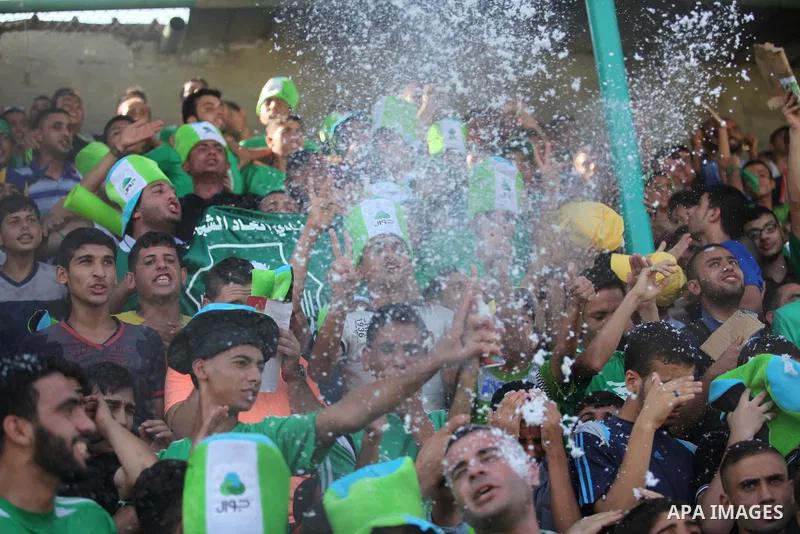 Fans attend the first leg match of the Palestine Cup final between Palestinian Gaza's Shejaya team and Hebron's Al-Ahly team at Yarmuk stadium in Gaza City, on August 6, 2015, as the two teams play each other for the fir...