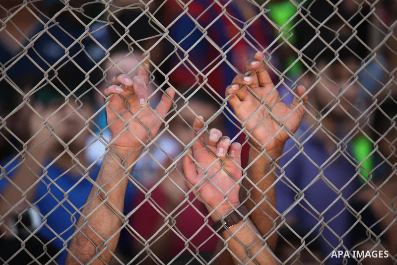 Fans attend the first leg match of the Palestine Cup final between Palestinian Gaza's Shejaya team and Hebron's Al-Ahly team at Yarmuk stadium in Gaza City, on August 6, 2015, as the two teams play each other for the fir...