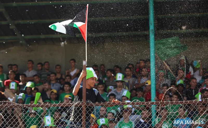 Fans attend the first leg match of the Palestine Cup final between Palestinian Gaza's Shejaya team and Hebron's Al-Ahly team at Yarmuk stadium in Gaza City, on August 6, 2015, as the two teams play each other for the fir...