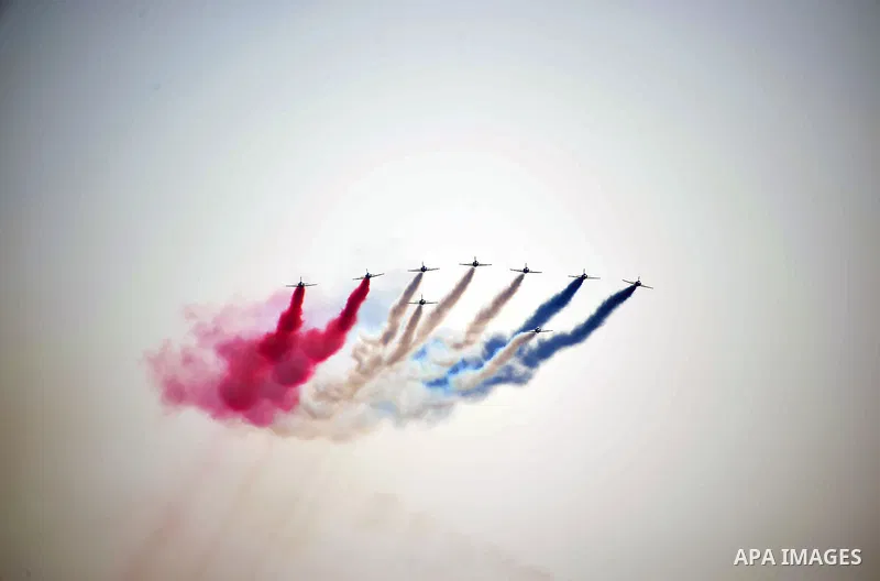 Egyptian air force planes parade during the inauguration ceremony of the new Suez Canal, in Ismailia, Egypt, August 6, 2015. Egypt staged a show of international support on Thursday as it inaugurated a major extension of...