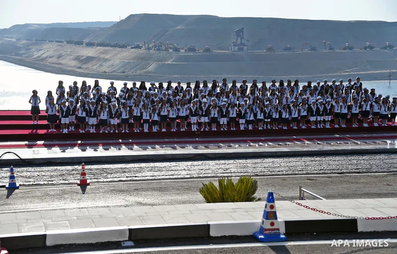 Egyptians perform during the inauguration ceremony of the new Suez Canal, in Ismailia, Egypt, August 6, 2015. Egypt staged a show of international support on Thursday as it inaugurated a major extension of the Suez Canal...