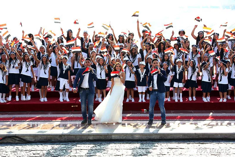 Egyptians perform during the inauguration ceremony of the new Suez Canal, in Ismailia, Egypt, August 6, 2015. Egypt staged a show of international support on Thursday as it inaugurated a major extension of the Suez Canal...