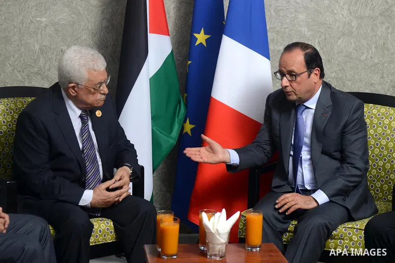 Palestinian President Mahmoud Abbas meets with French President Francois Hollande on the sidelines of events inaugurating the new additions to the Suez Canal, in Ismailia, Egypt, August 6, 2015. Egypt staged a show of in...