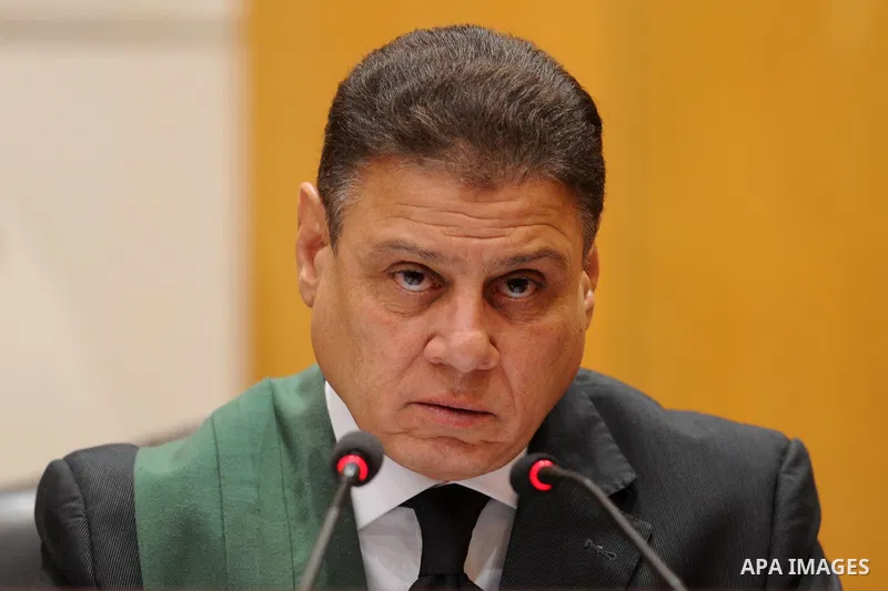 Egyptian Judge Mohammed Sheren Fahmi, attends the trial of Egyptian Muslim Brotherhood members along with ousted Islamist president Mohamed Morsi in a Cairo on August 8, 2015. Cairo Criminal Court resumes on Saturday the...