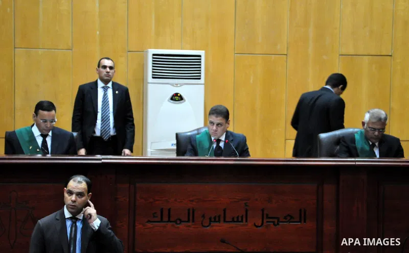 Egyptian Judge Mohammed Sheren Fahmi, attends the trial of Egyptian Muslim Brotherhood members along with ousted Islamist president Mohamed Morsi in a Cairo on August 8, 2015. Cairo Criminal Court resumes on Saturday the...
