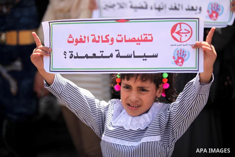 Palestinians supporters of the Popular Front for the Liberation of Palestine (PFLP) take part in a protest against the reduction of educational programs given by the United Nations Relief and Works Agency (UNRWA) in Gaza...