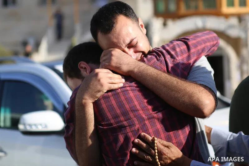 Relatives mourn during the funeral of Palestinian Anas Taha in the West Bank city of Ramallah, August 10, 2015. Israeli troops shot dead Taha who stabbed an Israeli man at a petrol station in the occupied West Bank on Su...