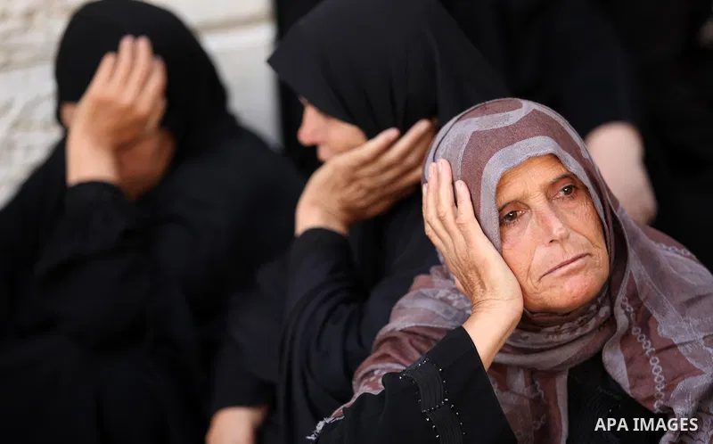 Palestinian families of martyrs take part a protest to demand their rights, in Gaza city, on August 11, 2015. Photo by Ashraf Amra