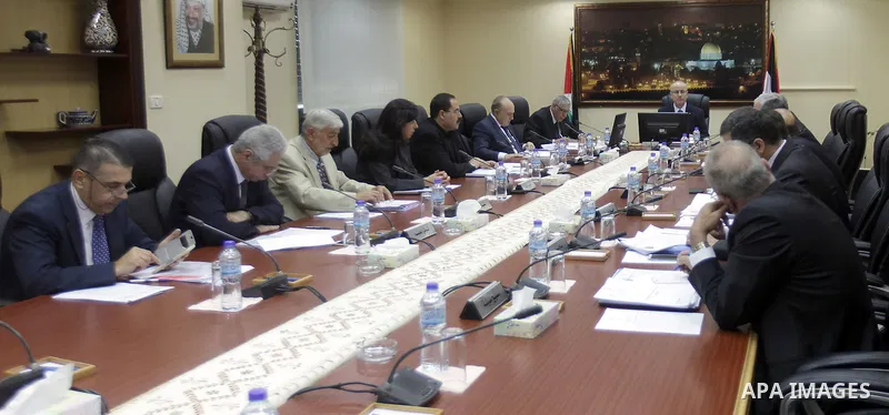 Palestinian Prime Minister Rami Hamdallah chairs a meeting of Council of Ministers in the West Bank city of Ramallah on August 11, 2015. Photo by Prime Minister Office