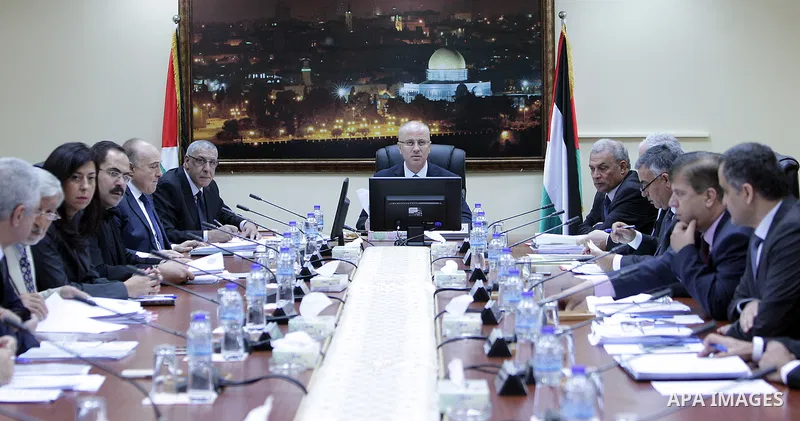 Palestinian Prime Minister Rami Hamdallah chairs a meeting of Council of Ministers in the West Bank city of Ramallah on August 11, 2015. Photo by Prime Minister Office