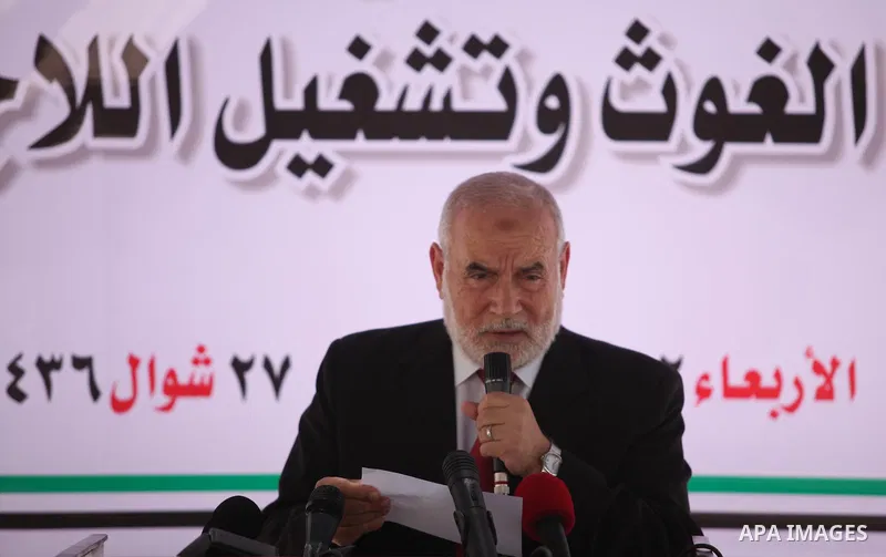 Deputy of the Legislative Council, Ahmed Bahar, speaks during a protest against the United Nations Relief and Works Agency (UNRWA), decision to reduce of the services in Gaza city on August 12, 2015. The Deputy Commissio...