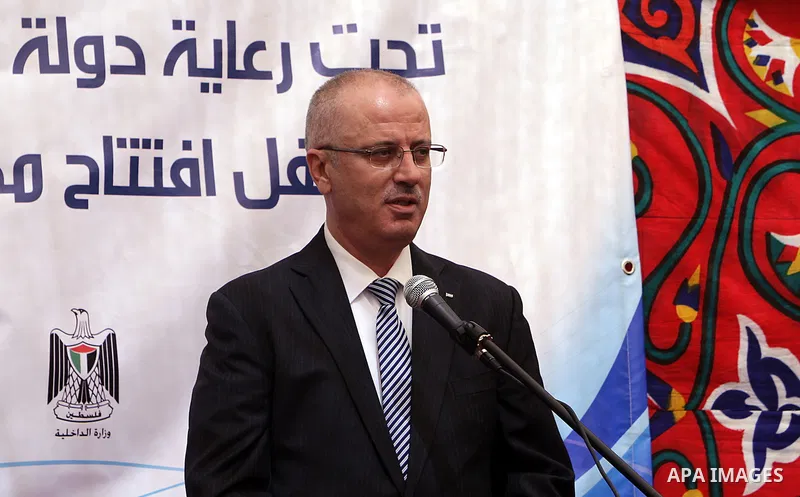 Palestinian Prime Minister Rami Hamdallah takes part in the opening of the Mowhda window office in the town of Bedo near Jerusalem on August 12, 2015. Photo by Prime Minister Office