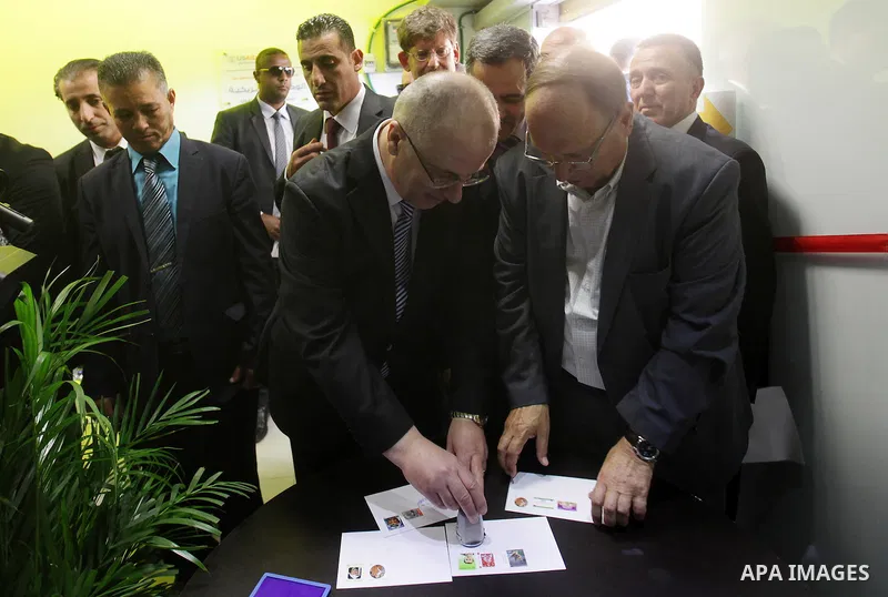 Palestinian Prime Minister Rami Hamdallah takes part in the opening of the Mowhda window office in the town of Bedo near Jerusalem on August 12, 2015. Photo by Prime Minister Office