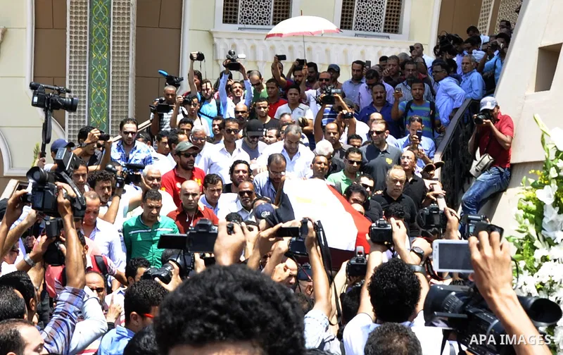 Friends and relatives of Egyptian actor Nur al-Sharif carry his coffin during his funeral at a mosque in Sheikh Zayed City, on the outskirts of Cairo, on August 12, 2015. The veteran pan-Arab film and TV star died on Aug...