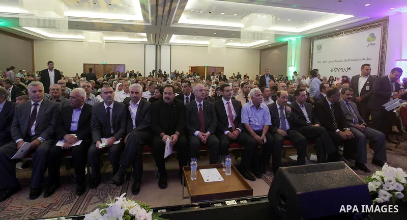 Palestinian Prime Minister Rami Hamdallah take part in a ceremony honoring the top students, in the West Bank city of Ramallah, on August 13, 2015. Photo by Prime Minister Office