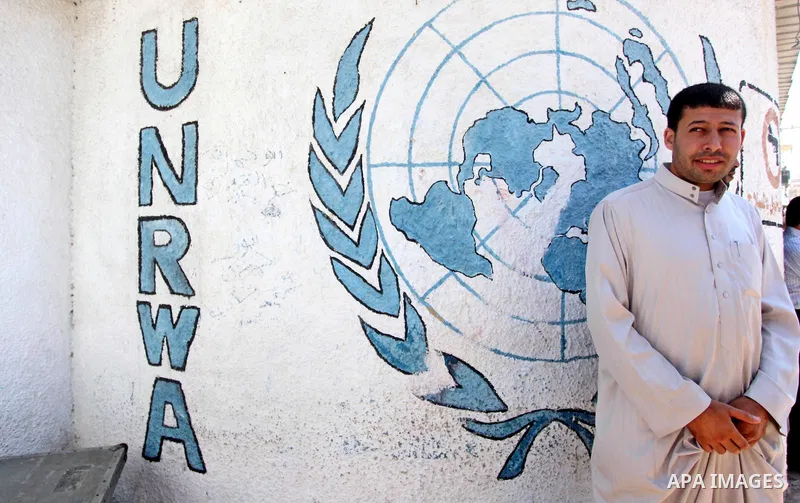 Palestinians take part in a protest against the reduction of educational programs given by the United Nations Relief and Works Agency (UNRWA) outside the UNRWA headquarters in Gaza city on August 14, 2015 . The UNRWA war...
