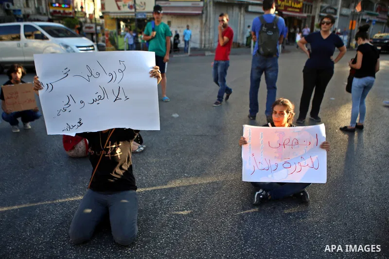 Protesters participate in a demonstration supporting the Palestinian prisoner in Israeli jails Mohammad Allan, during a protest in the West Bank city of Ramallah, on August 14, 2015. The Israeli military prosecutor inten...