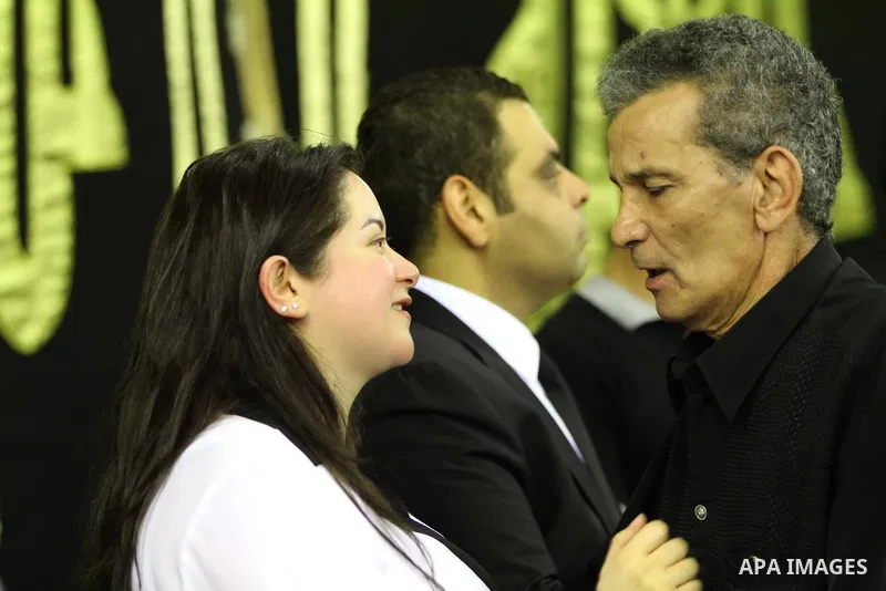 Mai, the daughter of Egyptian film star Nur al-Sharif, attends the funeral of her father on August 14, 2015, at Omar Makram Mosque, in Cairo. The veteran pan-Arab film and TV star died on August 11, 2015 following a brie...
