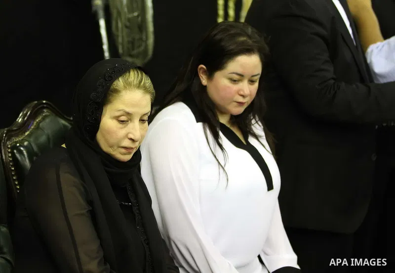 Poussie, the widow of Egyptian film star Nur al-Sharif, attends the funeral of her husband on August 14, 2015, at Omar Makram Mosque, in Cairo. The veteran pan-Arab film and TV star died on August 11, 2015 following a br...