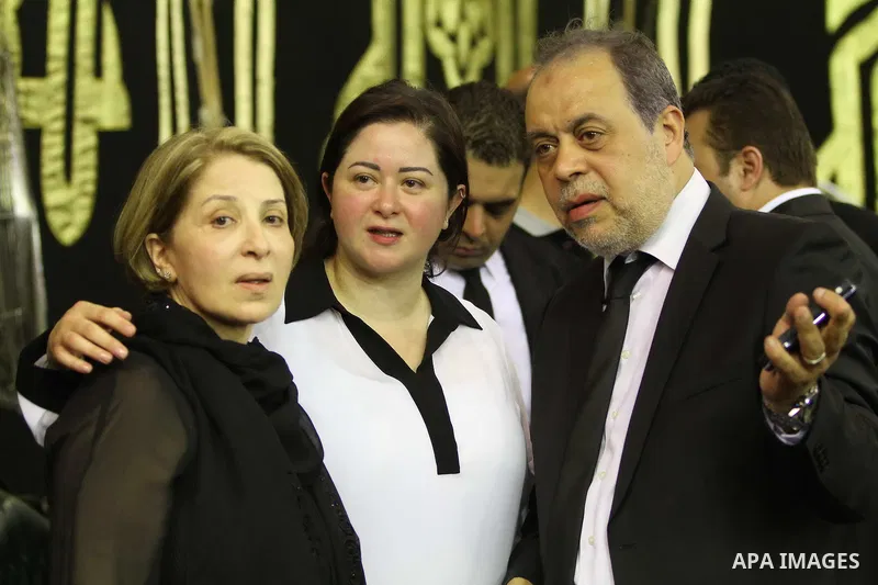 Poussie, the widow of Egyptian film star Nur al-Sharif, attends the funeral of her husband on August 14, 2015, at Omar Makram Mosque, in Cairo. The veteran pan-Arab film and TV star died on August 11, 2015 following a br...