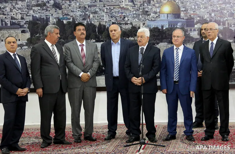 Palestinian President, Mahmoud Abbas (Abu Mazen) meets with Gaza Strip's Shejaiya's players and Hebron's Al-Ahly's players, in the West Bank city of Ramallah, on August 15, 2015. Photo by Osama Falah