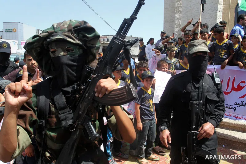 Members of Islamic Jihad take part in a protest to solidarity with prisoner Mohammad Allan allegedly being held in an Israeli jail, in Rafah in the southern Gaza Strip on August 16, 2015. Allan has been on hunger strike...
