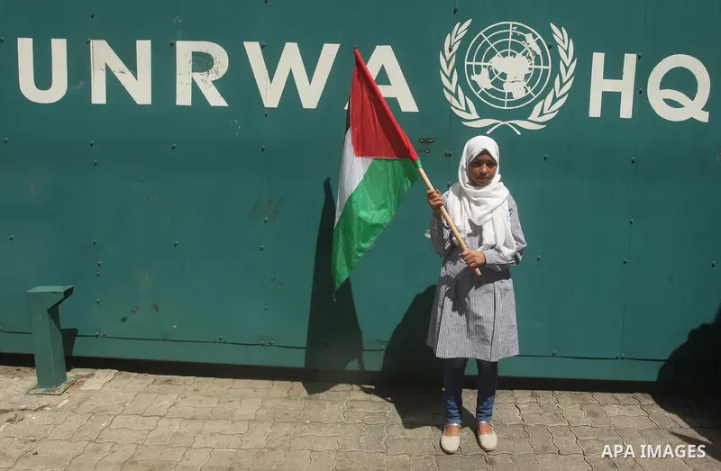 Palestinian women take part in a protest against possible reductions of the services and aid offered by United Nations Relief and Works Agency (UNRWA), in front of UNRWA headquarters in Gaza City August 16, 2015. Photo b...