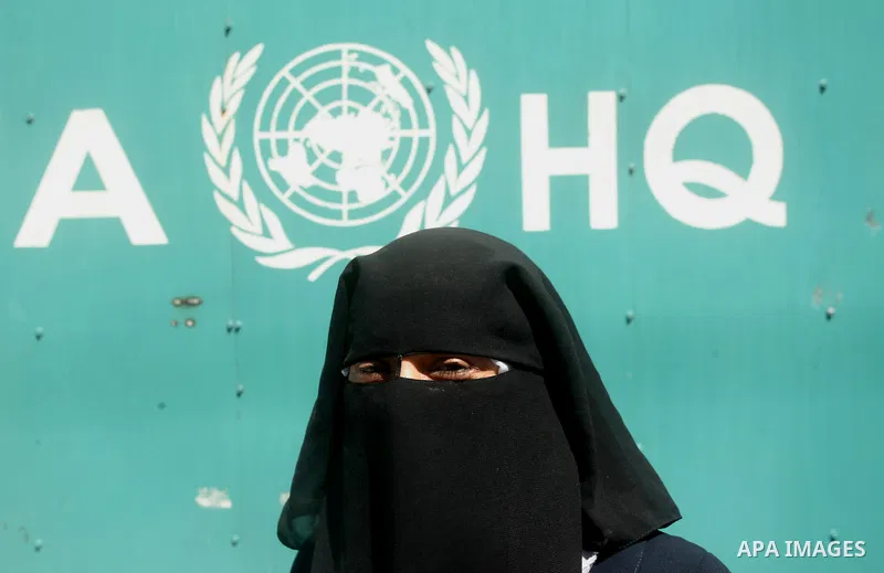 Palestinian women take part in a protest against possible reductions of the services and aid offered by United Nations Relief and Works Agency (UNRWA), in front of UNRWA headquarters in Gaza City August 16, 2015. Photo b...