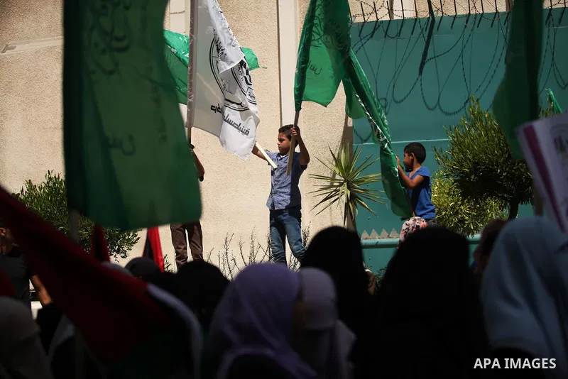 Palestinian women take part in a protest against possible reductions of the services and aid offered by United Nations Relief and Works Agency (UNRWA), in front of UNRWA headquarters in Gaza City August 16, 2015. Photo b...