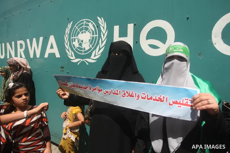 Palestinian women take part in a protest against possible reductions of the services and aid offered by United Nations Relief and Works Agency (UNRWA), in front of UNRWA headquarters in Gaza City August 16, 2015. Photo b...